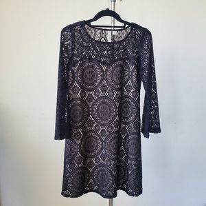 Black lace overlay dress with bell sleeves